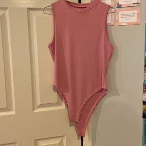 Pink body suit